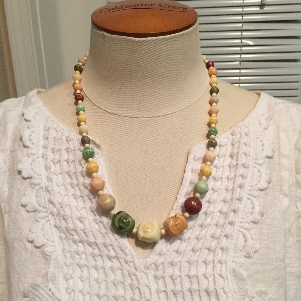 Adorable vintage necklace in pastel natural colors